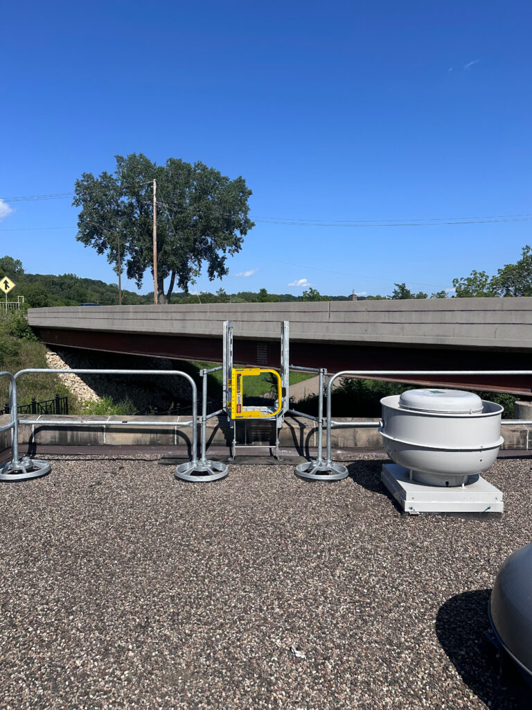 self-closing gate with SRC360 mobile rail on exterior rooftop