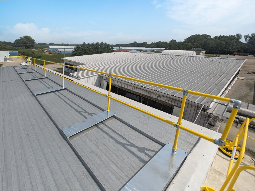 Accu-Fit metal roof base on exterior metal roof