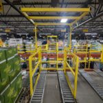 mezzanine pivot gate inside warehouse