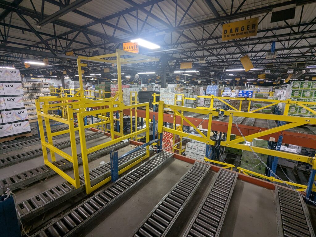 mezzanine pivot gate inside warehouse