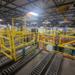 mezzanine pivot gate inside warehouse