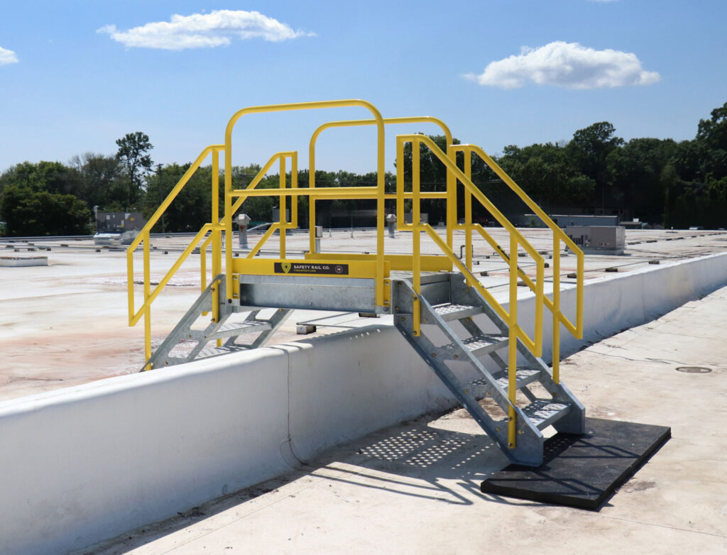 crossover modular stair system over wall on exterior rooftop